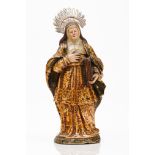 Saint Rita of CasciaPolychrome and gilt terracotta sculpture Silver radiant halo Portugal, 18th