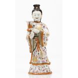 A Guanyin candle standChinese export porcelain Polychrome and gilt "Famille Rose" enamelled