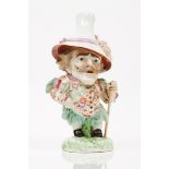 A Mansion House dwarf, DerbyDerby porcelain Polychrome decoration Floral coat and hat with pink