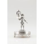 A toothpick holderPortuguese silver Boy on plinth holding a pear on a 3 feet circular galleried