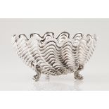 A bowlPortuguese silver Spiralled moulded shell on 3 stylised dolphin feet Eagle hallmark 925/