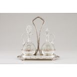 A cruet setPortuguese silver and two cut glass cruets Plain scalloped stand of foliage engraved