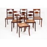 A set of six roll top chairsRosewood Canned seats Scalloped and pierced mahogany and satinwood