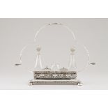 An Art Nouveau cruet setPortuguese silver and cut glass Rectangular base of pierced gallery with