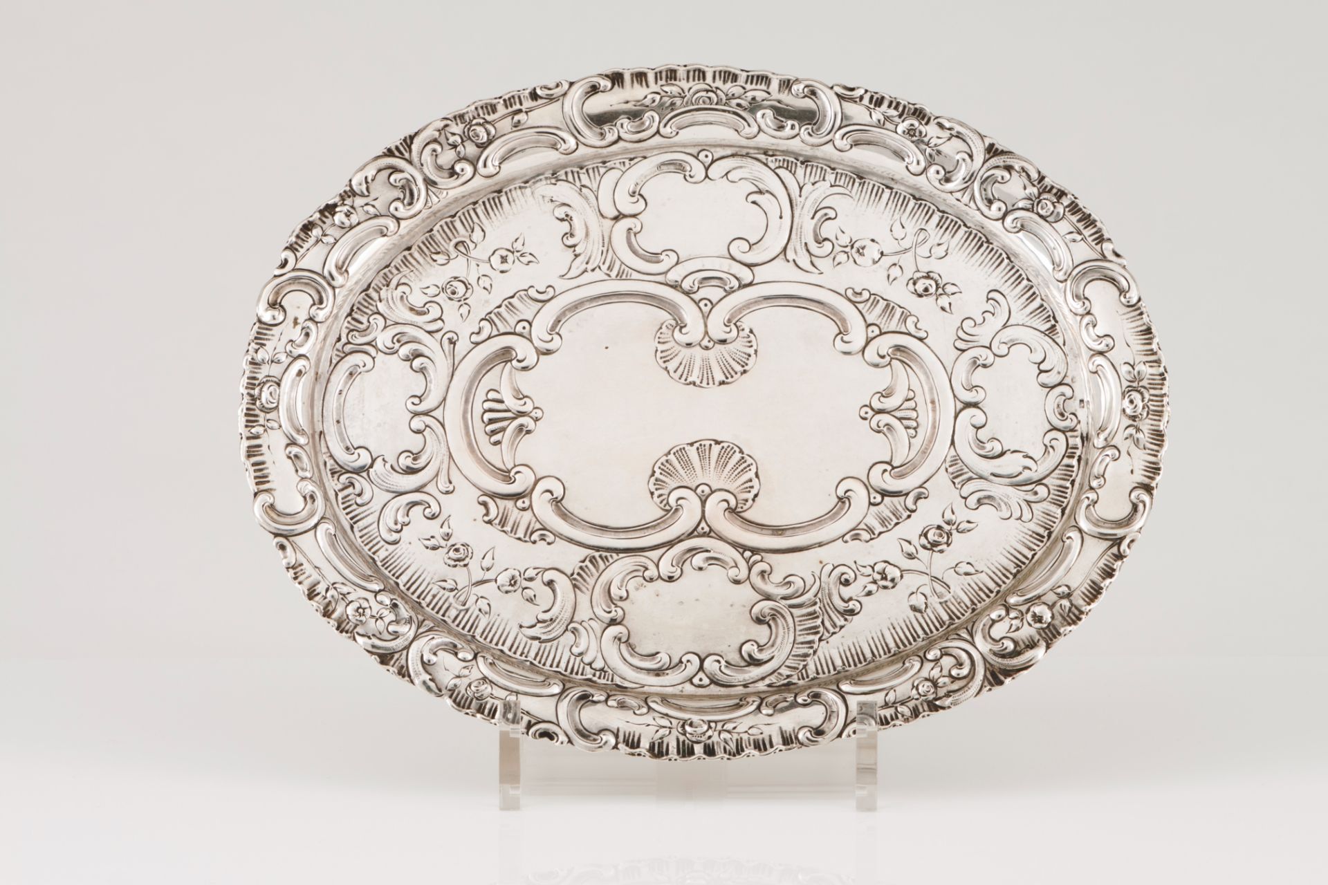 A small serving platterGerman silver Elliptic shaped fully decorated with foliage elements, winglets
