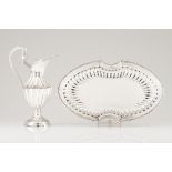 A basin and ewerPortuguese silver D.Maria style decoration of scalloped and inlaid body with