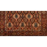 A Bakhtiari rug, IranWool and cotton Floral geometric pattern in brown, orange, beige and