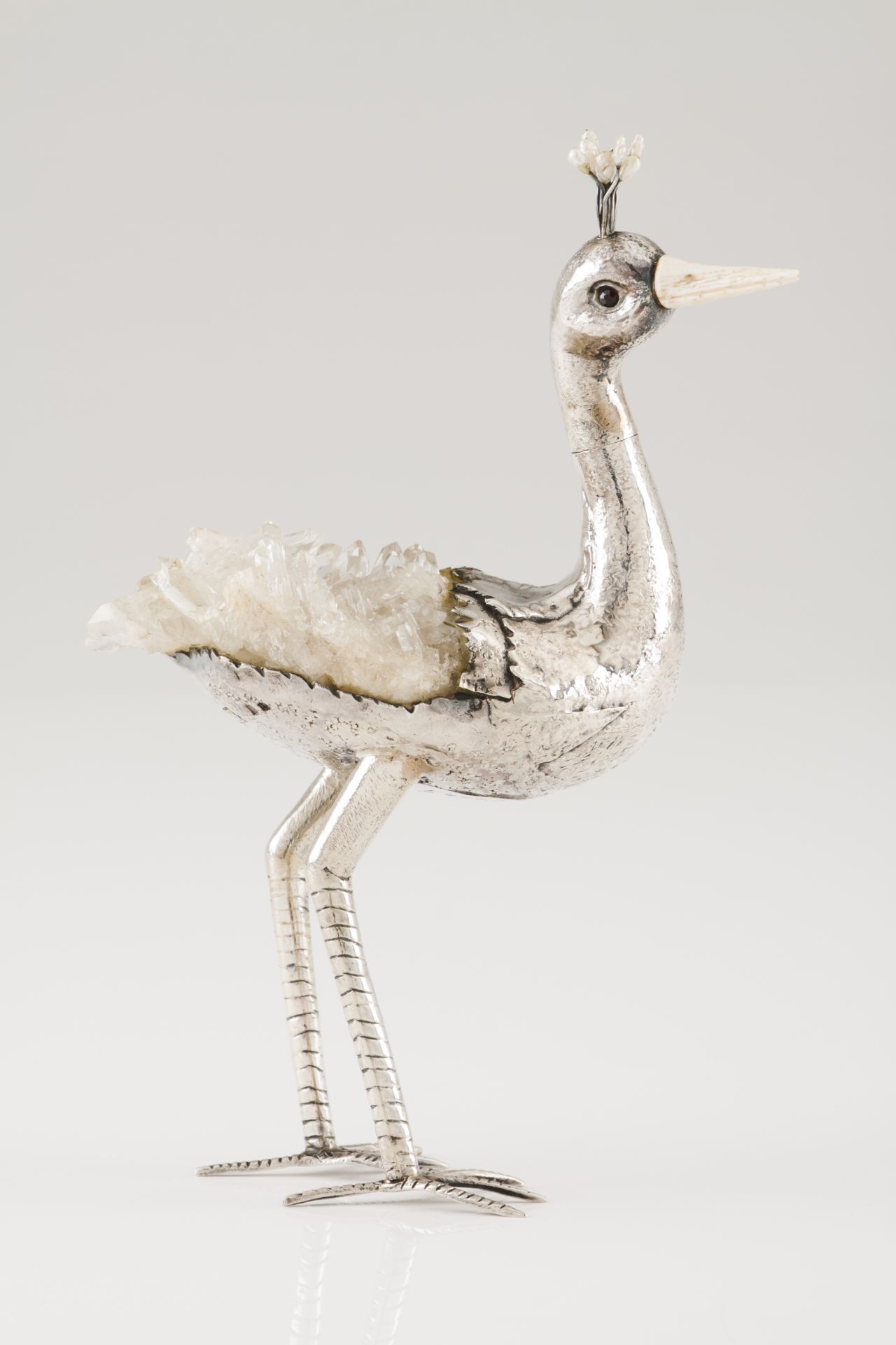 A Luiz Ferreira long legged birdSilver and quartz crystal Moulded and chiselled sculpture with