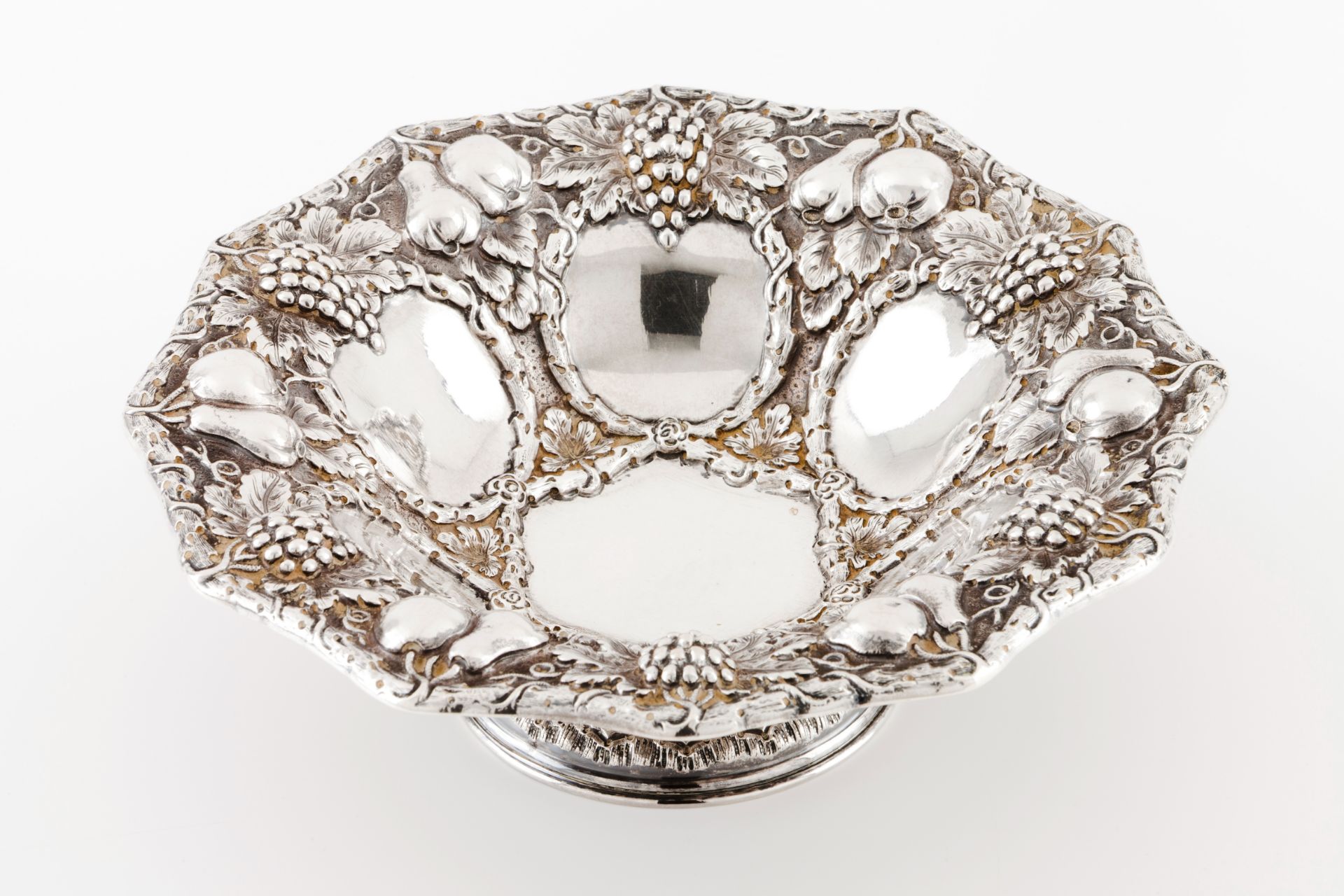 A small fruit bowlPortuguese silver Profuse raised decoration with fruits and blanc frames Boar