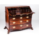 A D.José bureau Rosewood and other timbers Four long drawers Carved decoration and yellow metal