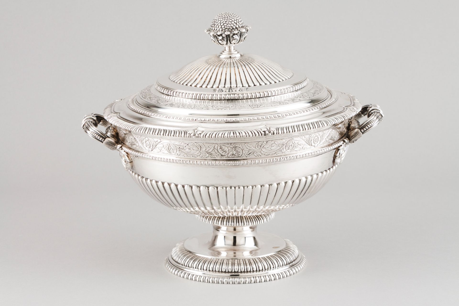 A tureen with coverPortuguese silver Part fluted and chiselled circular body of foliage bands and