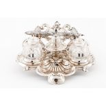 An inkwellPortuguese silver Scalloped shell shaped base of relief flowers and volutes decoration Cut