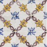 A tile panelYellow, blue and manganese floral decoration 9 tiles Portugal, 18th century (faults