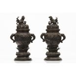 A pair of incense burners