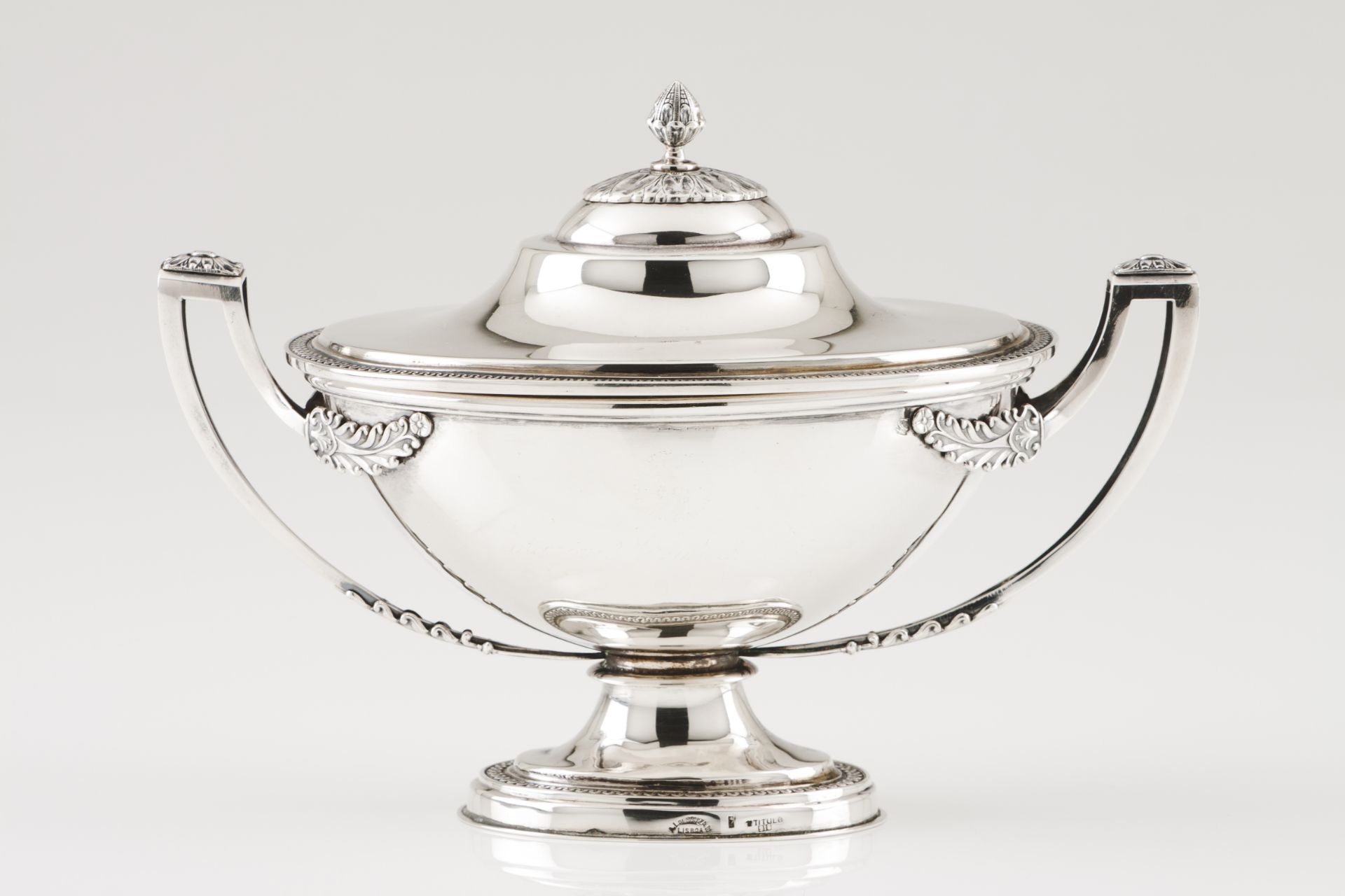 A bonbon dishSilver Empire style shaped as a tureen Engraved friezes decoration and applied floral
