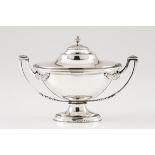 A bonbon dishSilver Empire style shaped as a tureen Engraved friezes decoration and applied floral