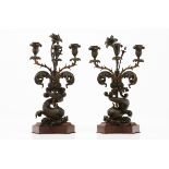 A pair of three branch candelabraRaised and patinated bronze Dolphin head and marble stand France,