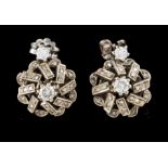 A pair of earringsPortuguese gold Small cluster set with 4 brilliant cut diamonds totalling (ca. 0.