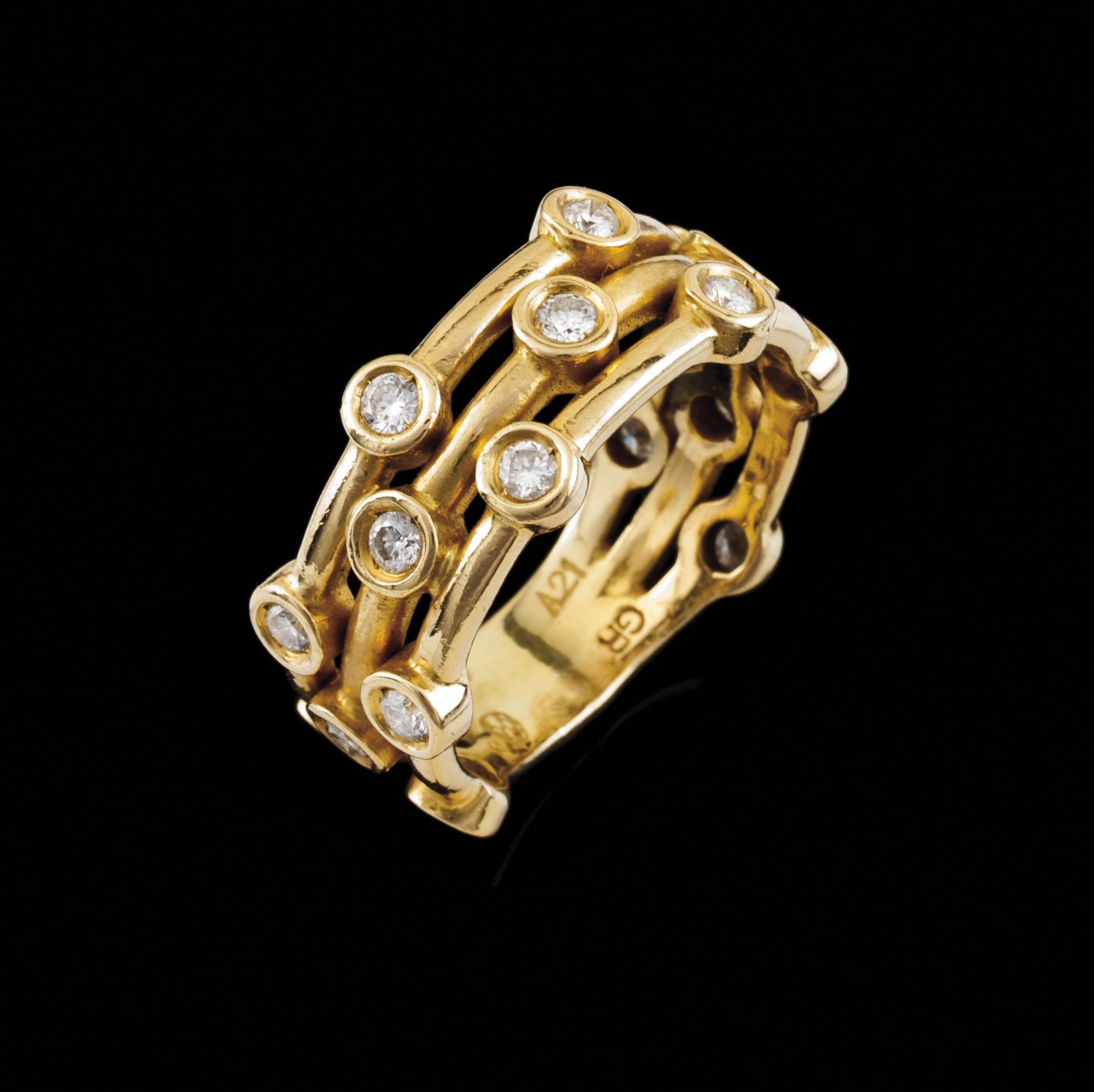 A ring bandGold Triple band set with 17 brilliant cut diamonds totalling (ca. 0.60ct) Ram hallmark