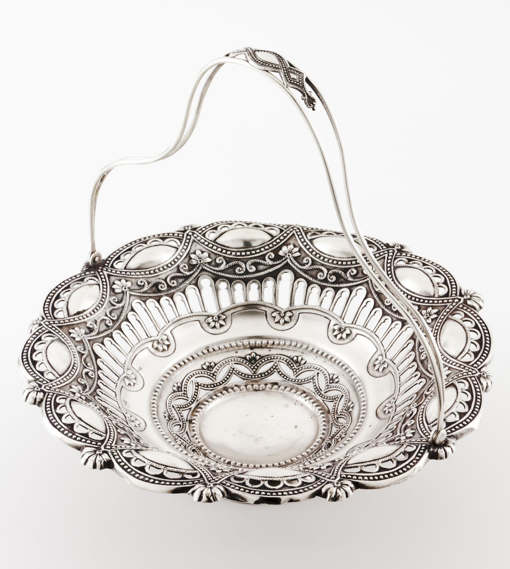 A basketPortuguese silver Pierced and raised of architectural and foliage motifs and beaded