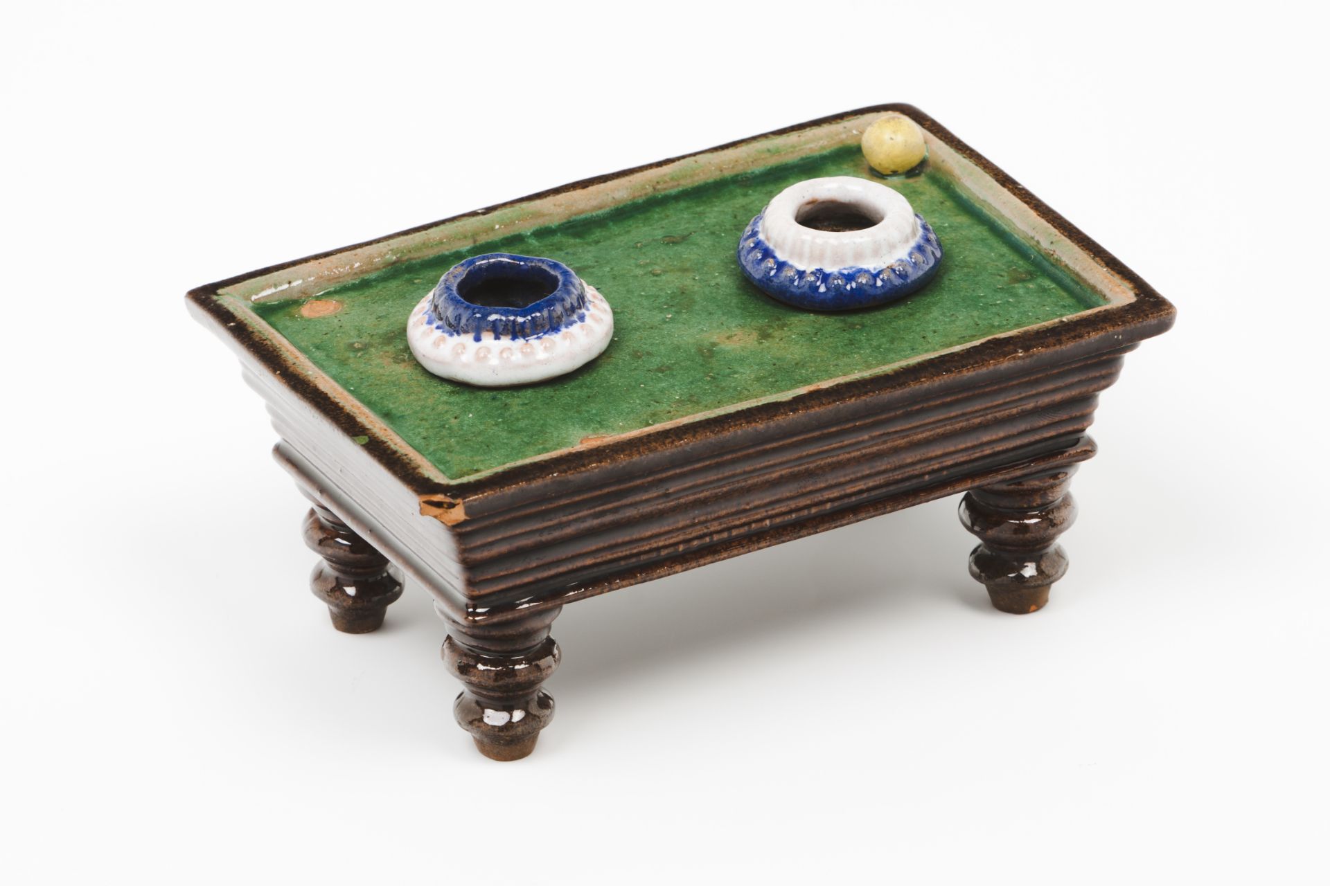An inkwell- Snooker table