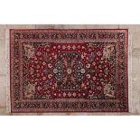 Kashal rug, IranIn wood and cotton Geometric design in shades of burgundy, green, blue and