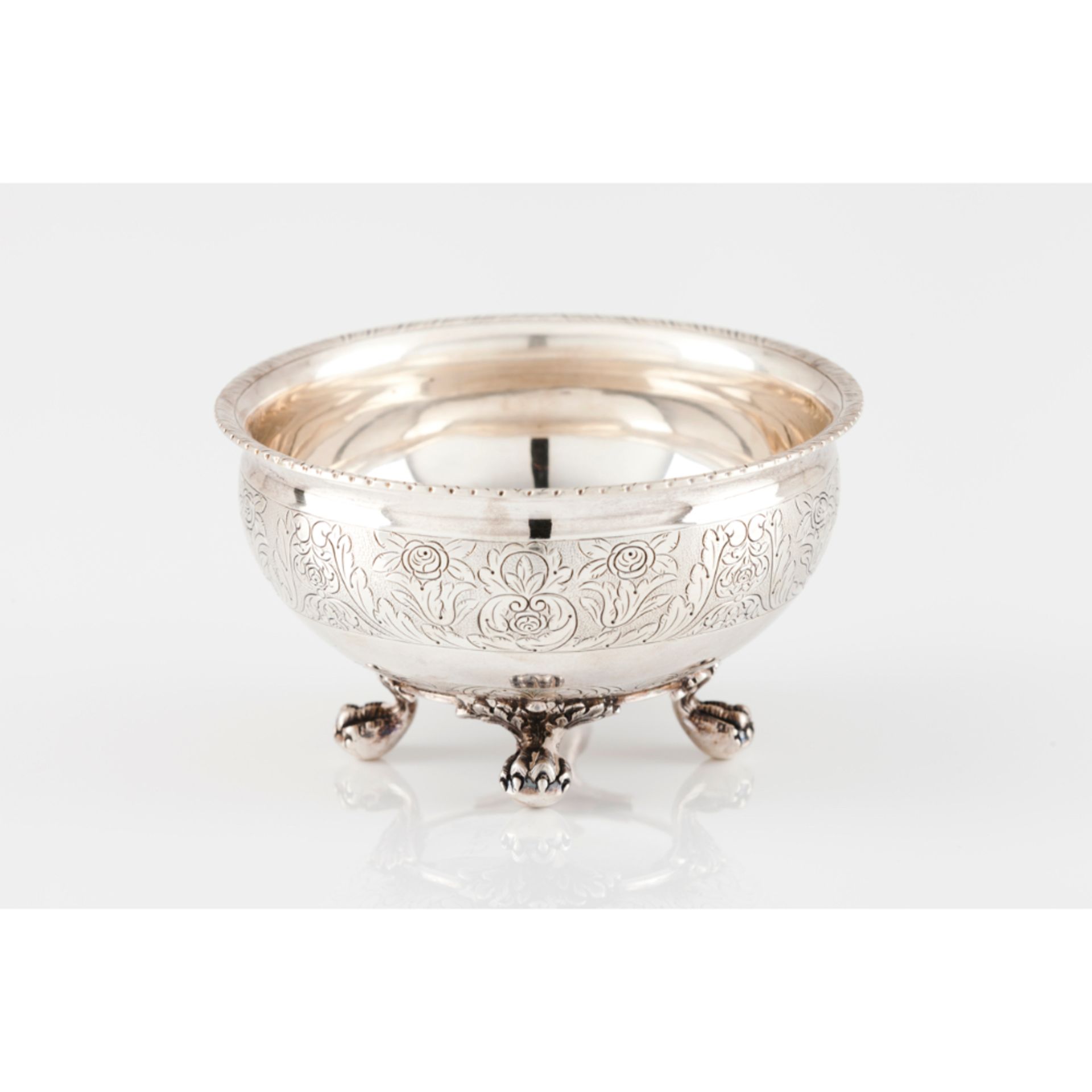 A waste bowlPortuguese silver Foliage engraved banded decoration On four claw and ball feet Lisbon