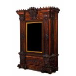 A large cupboardSolid and veneered rosewood and other timbers Carved decoration of geometric