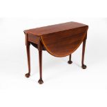 A drop-leaf tableIn Brazilian mahogany Satinwood ribbons and fillets Claw legs and ball Portugal,