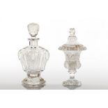 A pair of bottles and stoppersMoulded glass Europe, 19th century Height: 14,5 cm