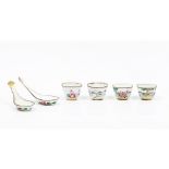 A set of four bowls and two spoonsEnamel on copper Polychrome decoration of landscape with