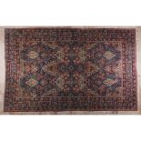 A Sarough rug, IranIn wool and cotton Floral and geometric design in shades of burgundy, blue, green