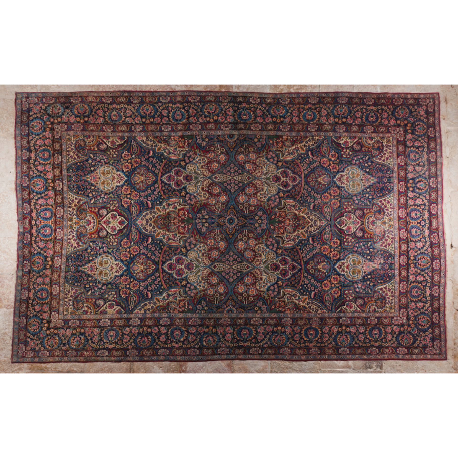 A Sarough rug, IranIn wool and cotton Floral and geometric design in shades of burgundy, blue, green
