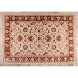 A Mazar rugWool and cotton Geometric and floral design in shades of beige and burgundy 410x307 cm