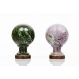 A set of two staircase finials Green and lilac marble Metal fittings Possibly Baccarat or Saint
