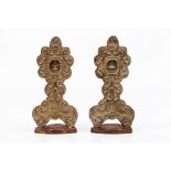 A pair of reliquariesMonstrance shaped Gilt and scalloped wood The front coated in volute and