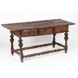 A "bufete" tableChestnut and other timbers Three drawers Iron handles Turned feet and stretchers