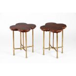 A pair of side tablesDarkened wood Scalloped four leaved clover shaped top On four brass feet