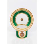A cup and saucerVista Alegre porcelain Polychrome and gilt decoration of Portuguese Royal Arms