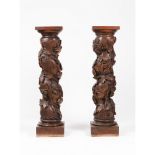 A pair of pseudo-Solomonic columnsChestnut Foliage and grapes carved decoration Portugal, 18th