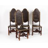 A set of four tall back chairsChestnut and other timbers Embossed leather seats and backs with