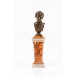 A small bustPatinated bronze on a marble column Europe, 19th century (minor losses, faults and