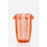 A vaseColoured moulded glass Scalloped rim (minor chips)Height: 20,5cm
