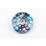 A paperweightGlass paste Inner "millefiori" decoration 20th centuryDiam.: 8 cm