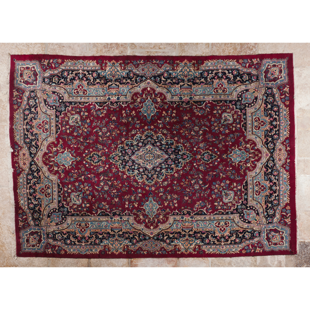 A Kashan rug, IranIn Wool and cotton Floral design in shades of beige, burgundy, green and blue