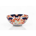 A bowlJapanese porcelain Foliage motifs Imari decoration 19th/20th century (restoration and chips)