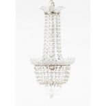 A small three light chandelierGlass and crystal70x35 cm