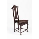 A chair/coat hangerMahogany with two drawers for belts and cufflinks Label to back "Papworth