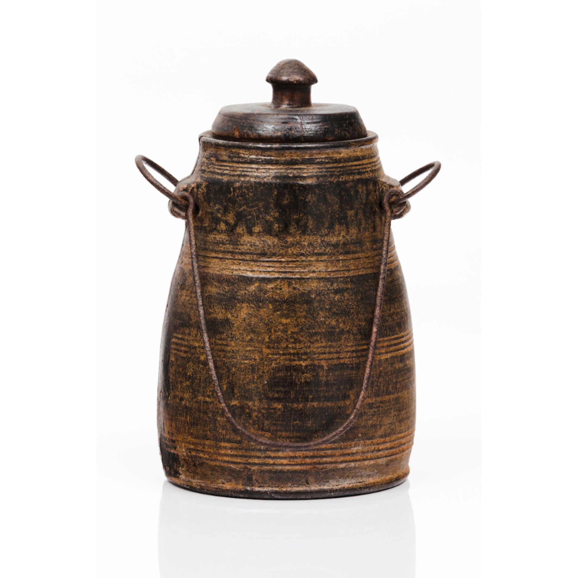 A tea caddy and coverBlack angelim wood Striated bands decoration and articulated iron handle India,