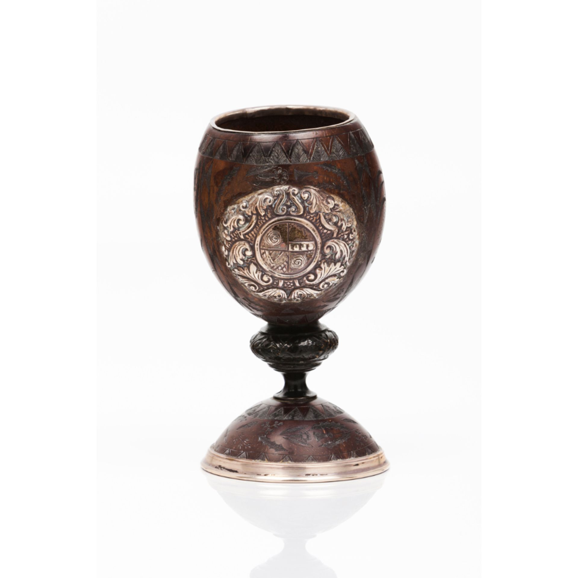 A chalice and coverCoconut shell Silver mounts Unmarked frame in compliance with Decree-Law 120/